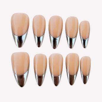 Lame de Miroir silver chrome French tip press on nails with a nude base, mirror-silver tips, glossy finish and medium stiletto shape.