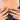 Model-hand view of Celestial Pumpkin Night Halloween pumpkin nails with jewel-like celestial details.