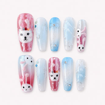 Bunny Bow Daydream cute bunny nails with pastel blue jelly bases, raised white bunnies and silver bows.