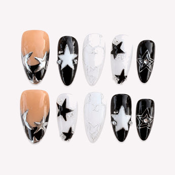 Lunar Nocturne chrome star nails with silver moons and raised white stars