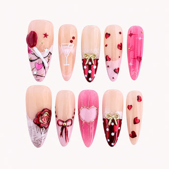 Rouge Rendezvous nude valentines nails with pink hearts, red rose and raised 3D bows