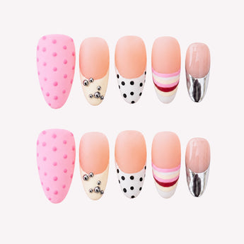 Bonbon Boulevard pink polka dot french tip nails with retro stripes and chrome accents