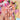 Dewlit Bloom pink 3D flower nails in the Model Hand 01 role, with raised florals and pearl-like dew-drop accents.
