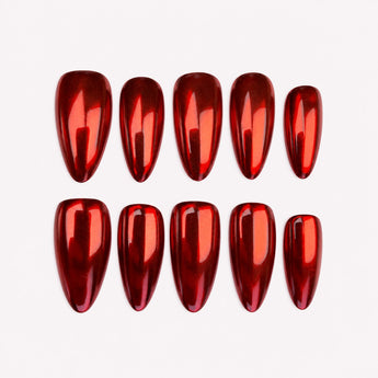 Scarlet Spotlight red chrome nails with a mirror-like finish, shown in a short almond shape.