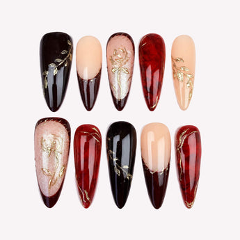 Crimson Briar press on nails with gold-tone roses, burgundy French tips and blush shimmer.