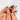 Cygne de Minuit almond black French tip press on nails worn on a hand with a sheer nude base, raised black 3D details and silver-tone accents.