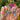 Silver Stardust glitter cat eye nails worn on a hand in a medium almond shape with icy blue silver sparkle, darker edge shading and a high-gloss finish.