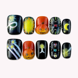 Celestial Pumpkin Night 3D Halloween nails with raised orange pumpkins, moon and starburst details.