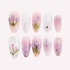 Lilac Dew Veil purple flower nails with lilac tulips, sheer pink bases, fine shimmer, and dew-like accents.