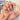 Bloom Dot Reverie colorful polka dot nails with raised pink, purple, and orange floral accents.
