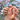 Dewlit Blossom Veil medium almond pink flower nails shown on hand with raised blooms and pearl-like dew details