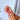 Rosy Afterglow almond press-on nails with a pink-to-red gradient and small silver-looking speckles.
