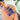 Cobalt Current short almond press on nails with sculptural blue waves and softly pointed tips.